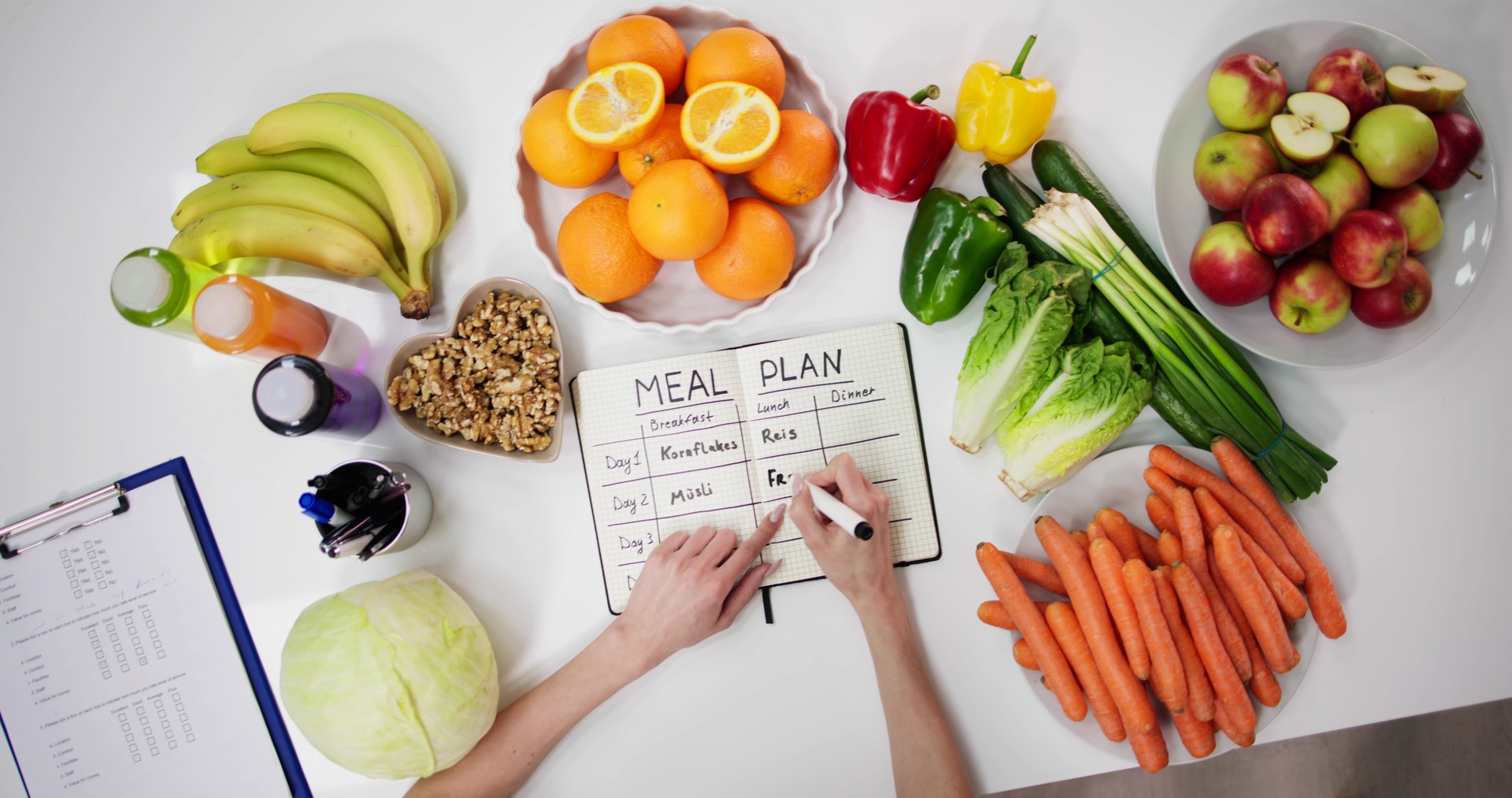 Female Dietitian Doctor Writing Meal Plan